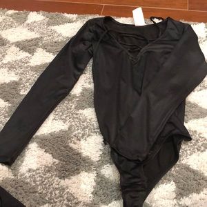 Black faux leather body suit